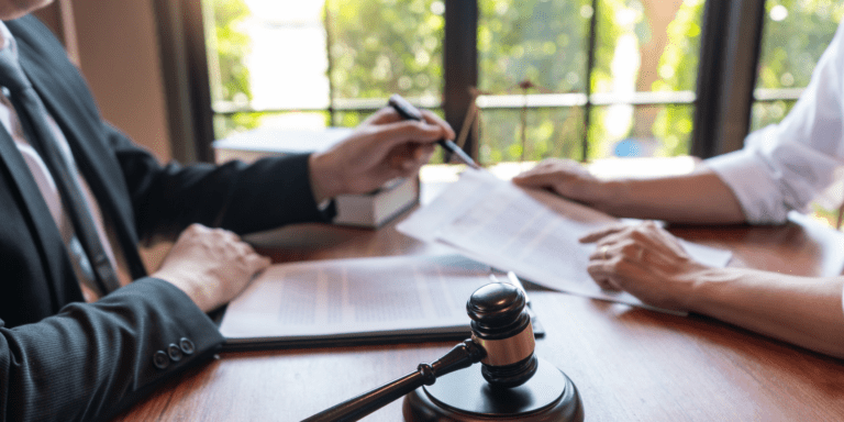 Two people looking over documents